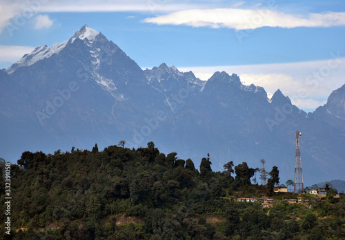 The snowcapped craggy Mt. Pandim reflects in the morning as seen in Damthang in South Sikkim. Mountains are seen almost from all parts of Sikkim being situated in Eastern Himalayas. photo