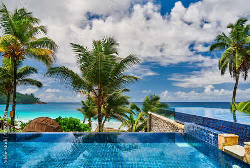 Fototapeta Naklejka Na Ścianę i Meble -  Beach with resort swimming pool at Seychelles