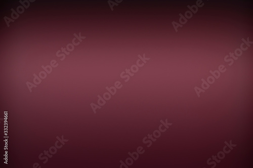 Calm abstract marsala background with dark black vignette border. Pink or red theme for elegant backdrop or any design