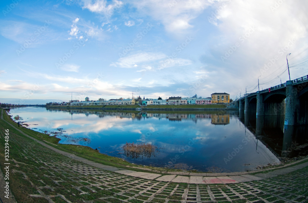 Riverview on the Volga river close to the New Volga bridge, Tver, Russia, evening light, cloudy sky, distortion perspective, fisheye, spring colors