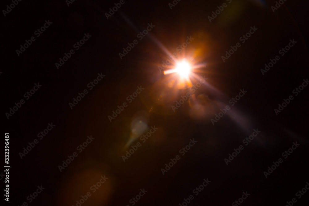 Abstract Natural Sun flare on the black background. Abstract Natural Sun flare on the black background.