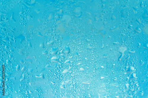  Background from drops on glass. Condensate drops on glass.