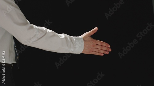 CORONAVIRUS: No one responds to a man shaking hands © Cliplab