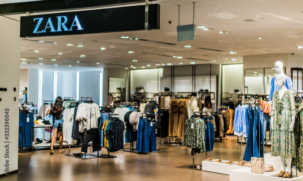 Front entrance to Zara store in Singapore shopping mall Stock Photo | Adobe  Stock