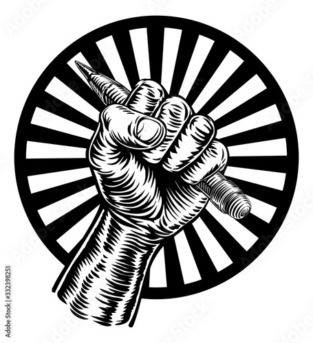 A fist hand holding a penci...