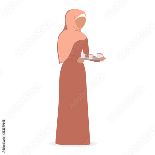 Muslim woman holding a tray with cup of tea