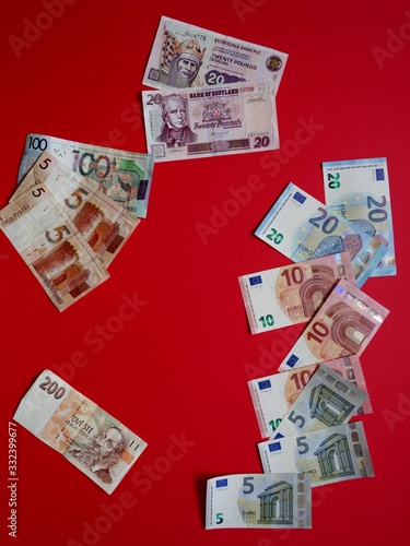 currency layout on a colored background