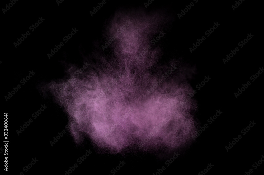 Purple powder explosion on black background. Colored powder cloud. Colorful dust explode. Paint Holi. Purple powder explosion on black background. Colored powder cloud. Colorful dust explode. Paint Holi.
