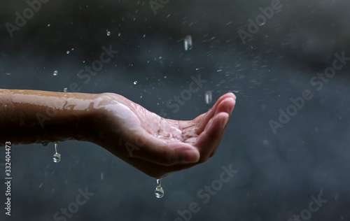 Palm hands with water splash