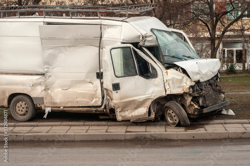 Fotografie Crushed in car accident transport van