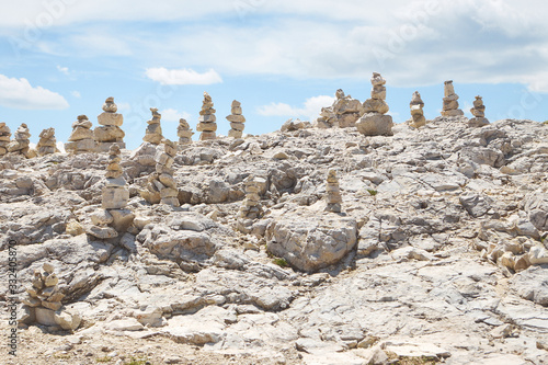 stones stautes on moutain. Inukshuk, ometto, Cairn, Ovoo, Rock balancing photo