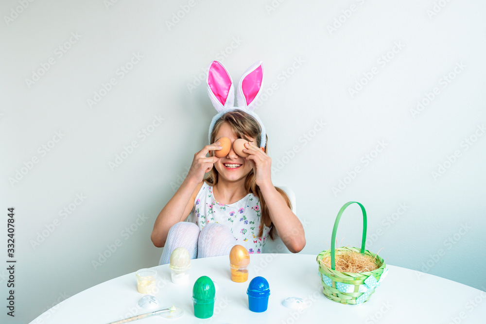 Cute little girl playing with Easter eggs Cute little girl playing with Easter eggs