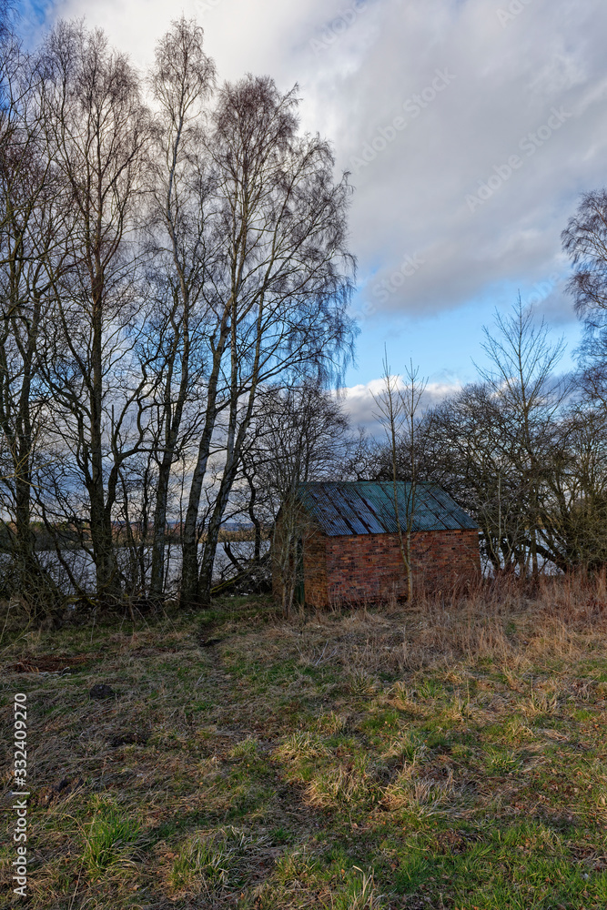 A Brick built old Boathouse hidden amongst the small trees beside Stormont Loch near to Blairgowrie in Perthshire. A Brick built old Boathouse hidden amongst the small trees beside Stormont Loch near to Blairgowrie in Perthshire.