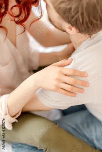 woman touches man s shoulder