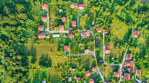 Aerial view of downtown Tuzla at sunset, Bosnia. City photographed by drone, traffic and objects , landscape.city photographed from air by drone.Old balkan buildings and communism type of architecture