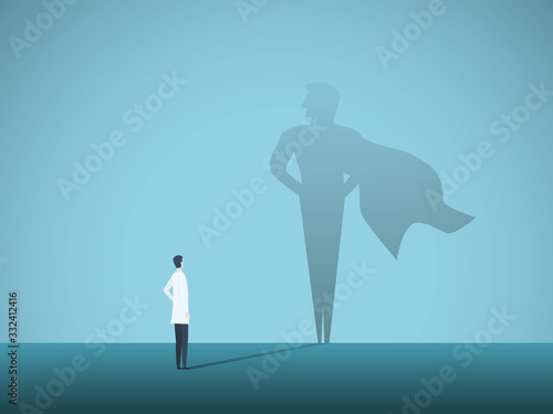 Male doctor looking at superhero shadow on the wall. Hospital staff, nurses heroes fight coronavirus pandemic, epidemic.