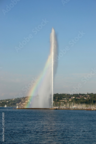 Jet d eau in Geneva with a rainbow in summer