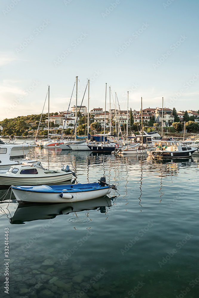 Various boats in marina in adriatic sea bay harbor in Pula Croatia