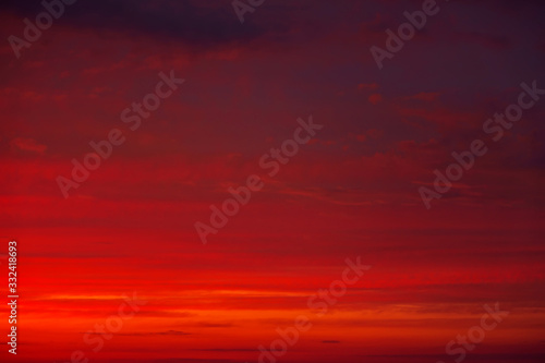 Beautiful Twilight sky background. Colorful Fiery orange and red sunset sky. © es0lex