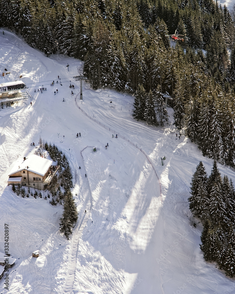 Slope at swiss alpine resort aerial view