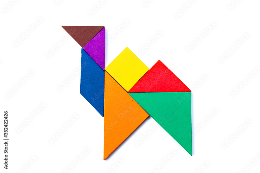 Color wood tangram puzzle in camel shape on white background Color wood tangram puzzle in camel shape on white background