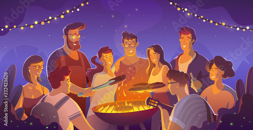 people and food concept - happy friends having meat for dinner at summer garden party at night.