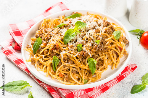Pasta Bolognese in white plate.