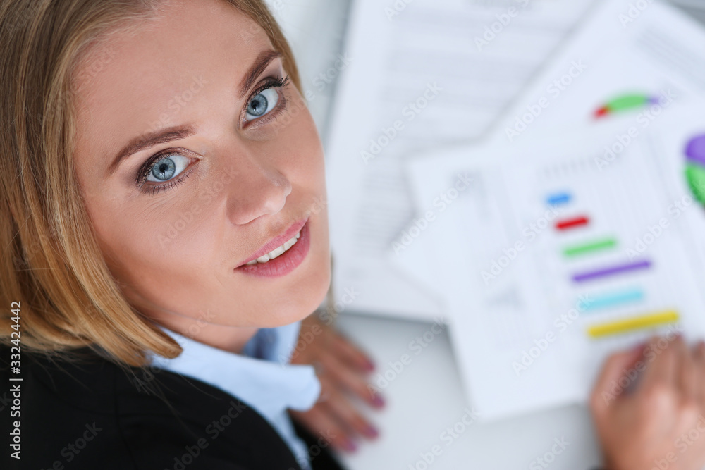 Beautiful smiling businesswoman portrait at workplace look in camera. White collar worker at workspace exchange market job offer certified public accountant internal Revenue officer concept Beautiful smiling businesswoman portrait at workplace look in camera. White collar worker at workspace exchange market job offer certified public accountant internal Revenue officer concept