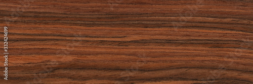 Attractive rosewood veneer background for your awesome exterior view. Natural wood texture, pattern. photo