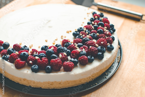 Homemade cheesecake with berries and nuts