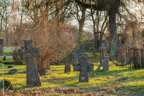 The old cemetery of the Catholic monastery of the Order of St. Brigitte. Limestone tombstones of the 17-19 centuries. photo