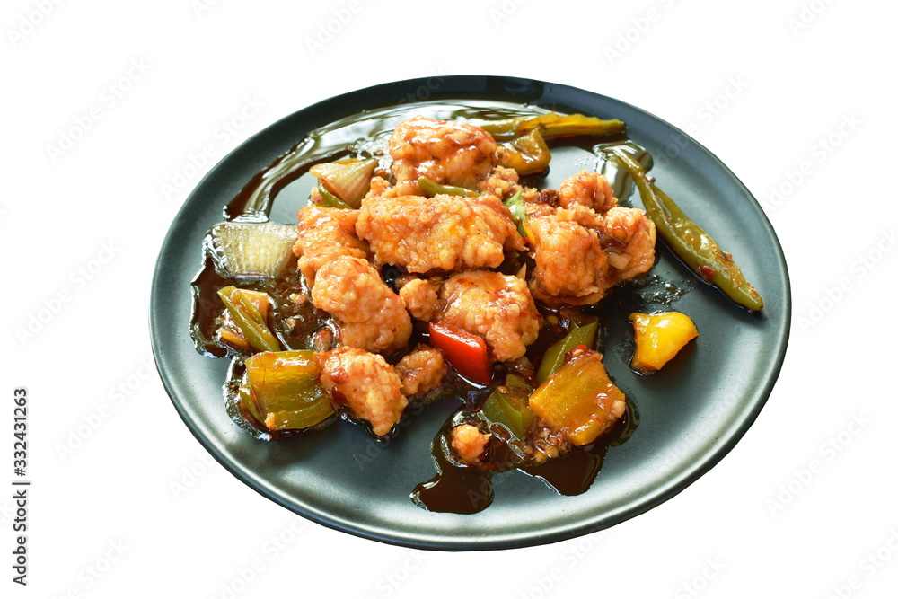 fried crispy chicken with slice bell pepper in sweet sauce on dish fried crispy chicken with slice bell pepper in sweet sauce on dish