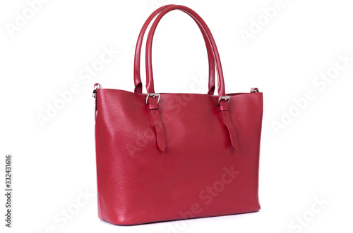 red leather hand made bag on a white background