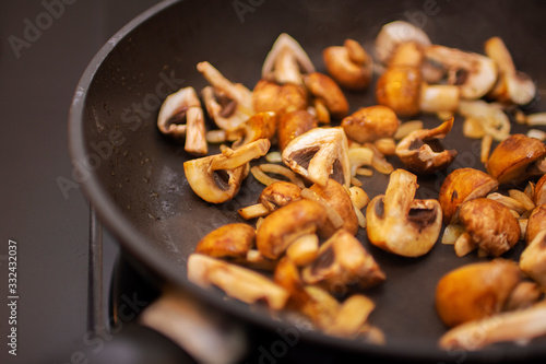 Fried mushrooms in a frying pan