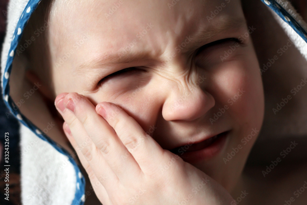 Toothache in a little boy, portrait Toothache in a little boy, portrait