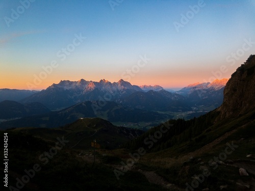 Sunset in the Austrian Alps  orange sun © Simon