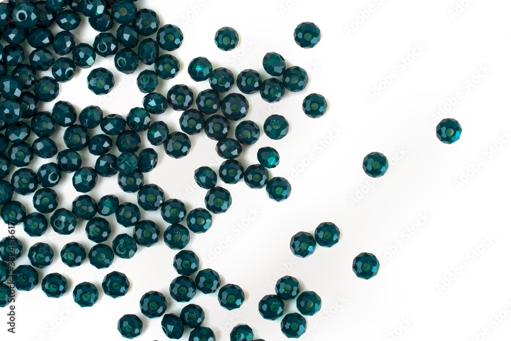 close up multi colored beads heap isolated on white close up multi colored beads heap isolated on white