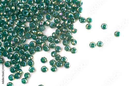 close up multi colored beads heap isolated on white
