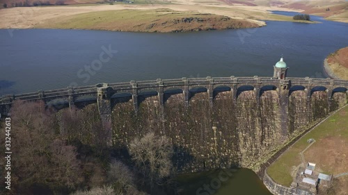 Aerial view of Craig goch elan valley. flying over dam white panning right