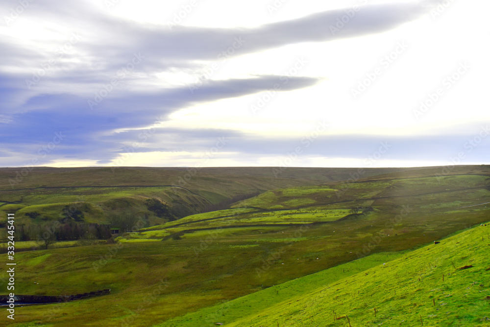 The Yorkshire Dales viewed from Romaldkirk. Famous of green fields, line of grystone walls. The Yorkshire Dales viewed from Romaldkirk. Famous of green fields, line of grystone walls.