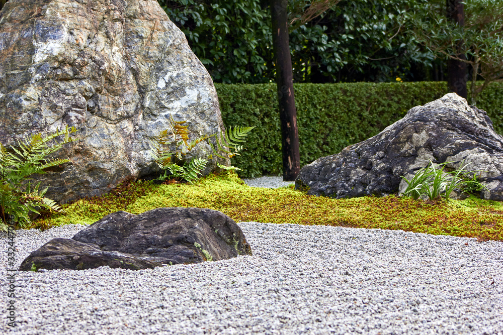 Stones and moss in Japanese style garden Stones and moss in Japanese style garden