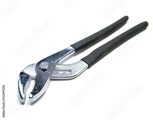 Plumbing wrench with black handles on a white background. Manual metal tool for loosening nuts and clamping parts.