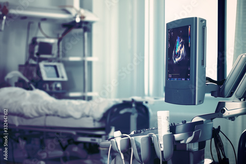 Foto Advanced technique for echoscopy by the critical patient under the clock monitor