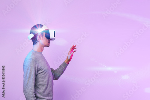 Man is using virtual reality headset.
