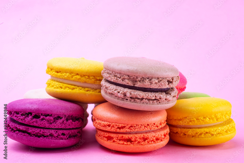 Traditional macaroon macaroon cookies on a pink background Traditional macaroon macaroon cookies on a pink background
