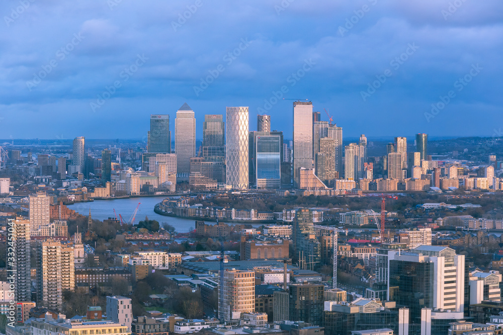 Aerial cityscape of London and the River Thames with Canary Wharf in the background