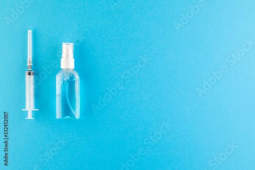 A set of hygienic antiseptics and medications on a blue background.