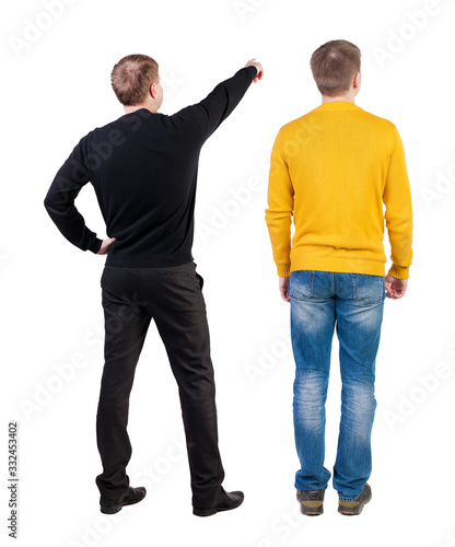 Back view of two man in sweater with mobile phone.