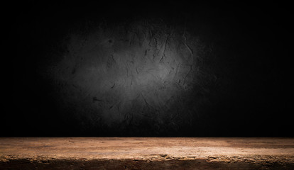 Selected focus empty brown wooden table and wall texture or old black brick wall blur background image. for your photomontage or product display