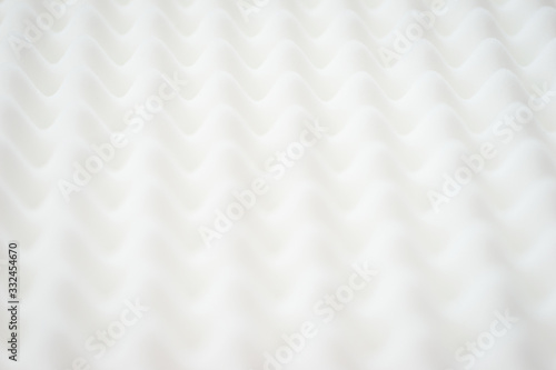 White gradient abstract background with many waves at different angles. © Evgenii Starkov